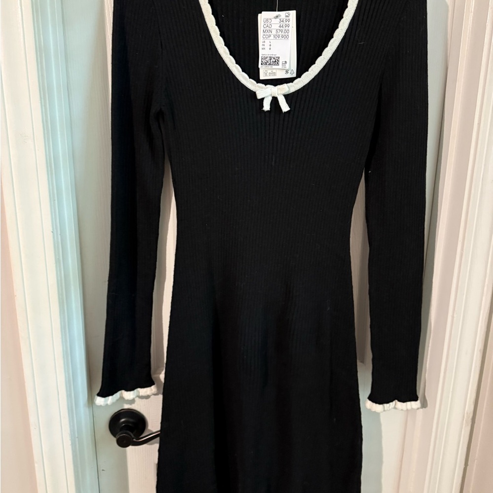 Divided Black Dress with White Accents